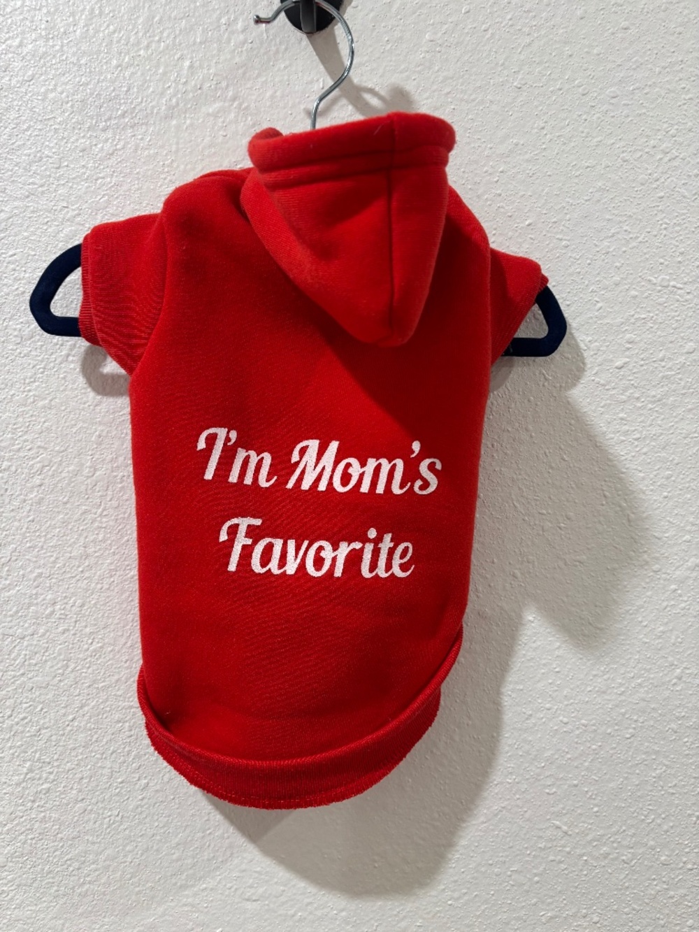 Fabdog red pet hoodie featuring the script text "I'm Mom's Favorite"